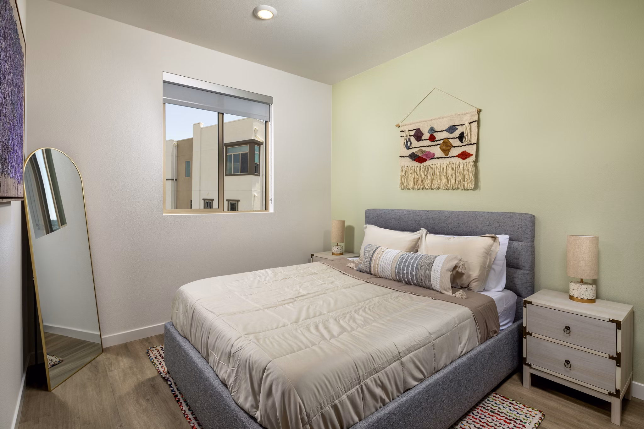 Suncrest at Ponte Vista: Luxurious bedroom with modern decor and natural light in Greystar's luxury apartments