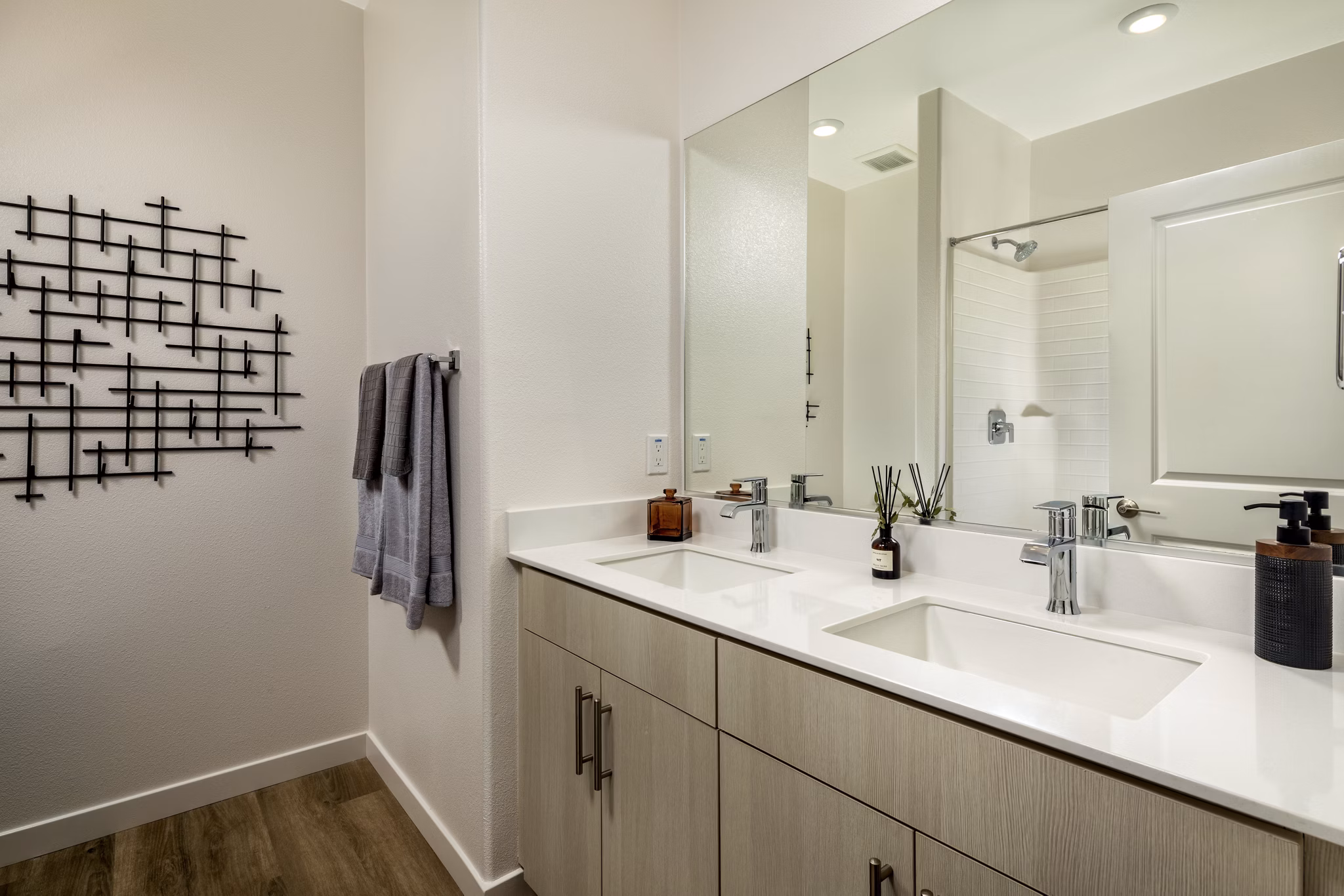 Modern bathroom with sleek fixtures at Suncrest at Ponte Vista Apartments, offering luxury living in a tranquil setting