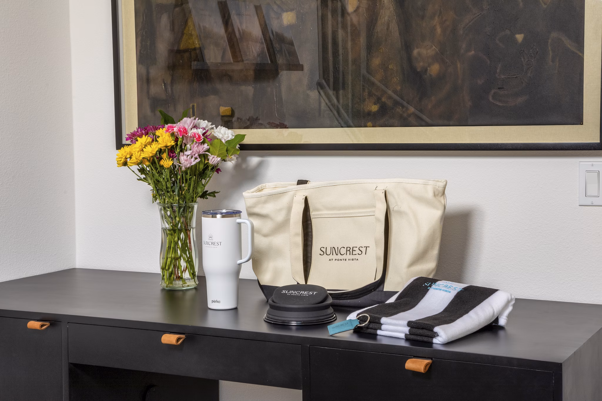 Spacious kitchen with granite countertops and stainless steel appliances at Suncrest at Ponte Vista Apartments