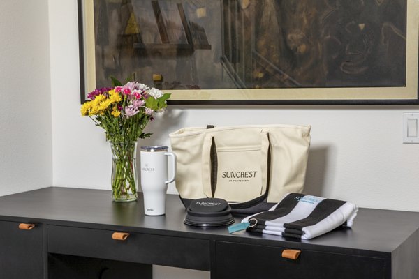 Spacious kitchen with granite countertops and stainless steel appliances at Suncrest at Ponte Vista Apartments