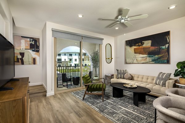 Spacious living room with modern decor at Suncrest at Ponte Vista Apartments