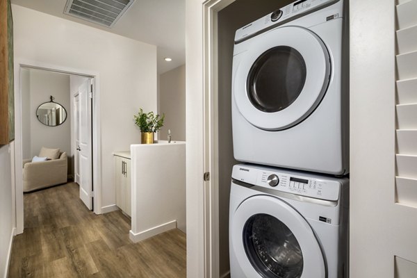 Laundry room equipped with modern appliances at Suncrest at Ponte Vista Apartments