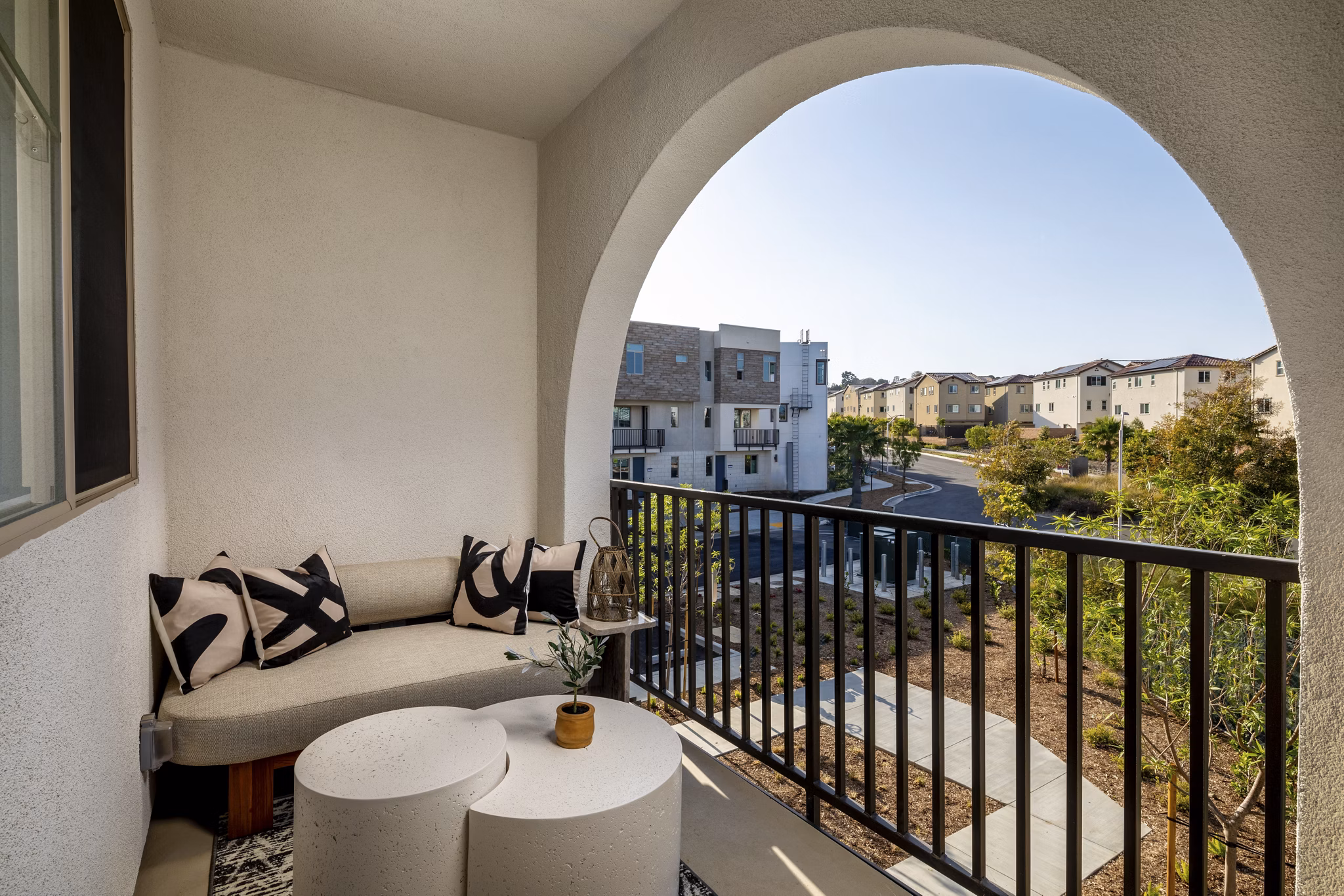 Suncrest at Ponte Vista Apartments: Spacious patio with outdoor seating and lush greenery, perfect for relaxation and gatherings in a serene setting