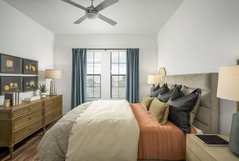 Cozy bedroom with stylish decor at The Alyssa Apartments