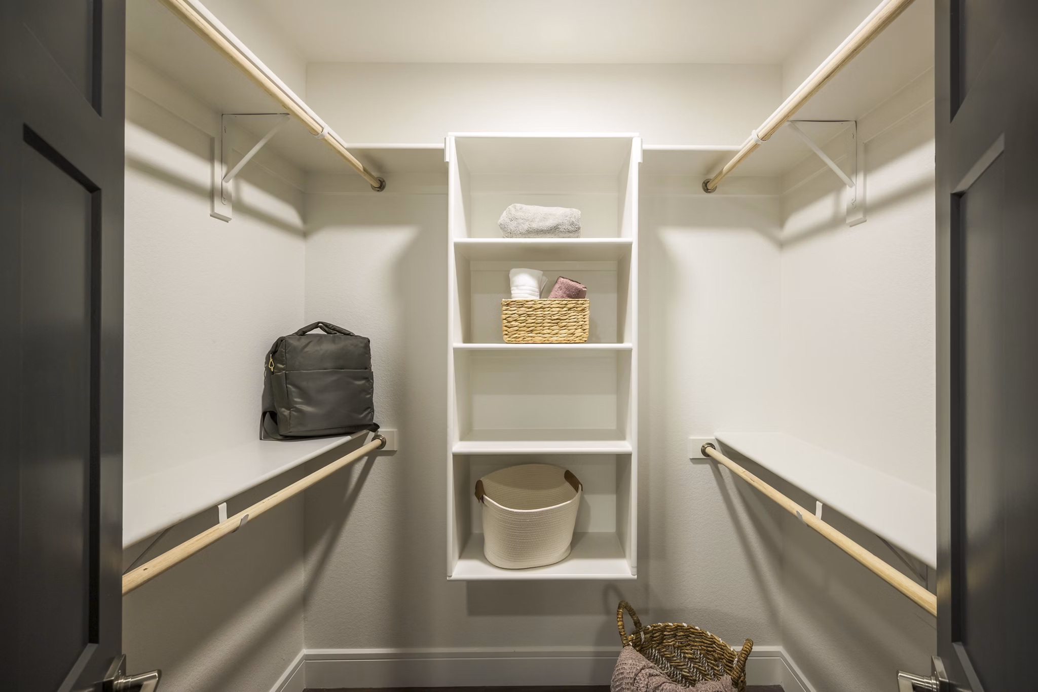 The Alyssa Apartments: Modern bedroom closet with ample storage solutions