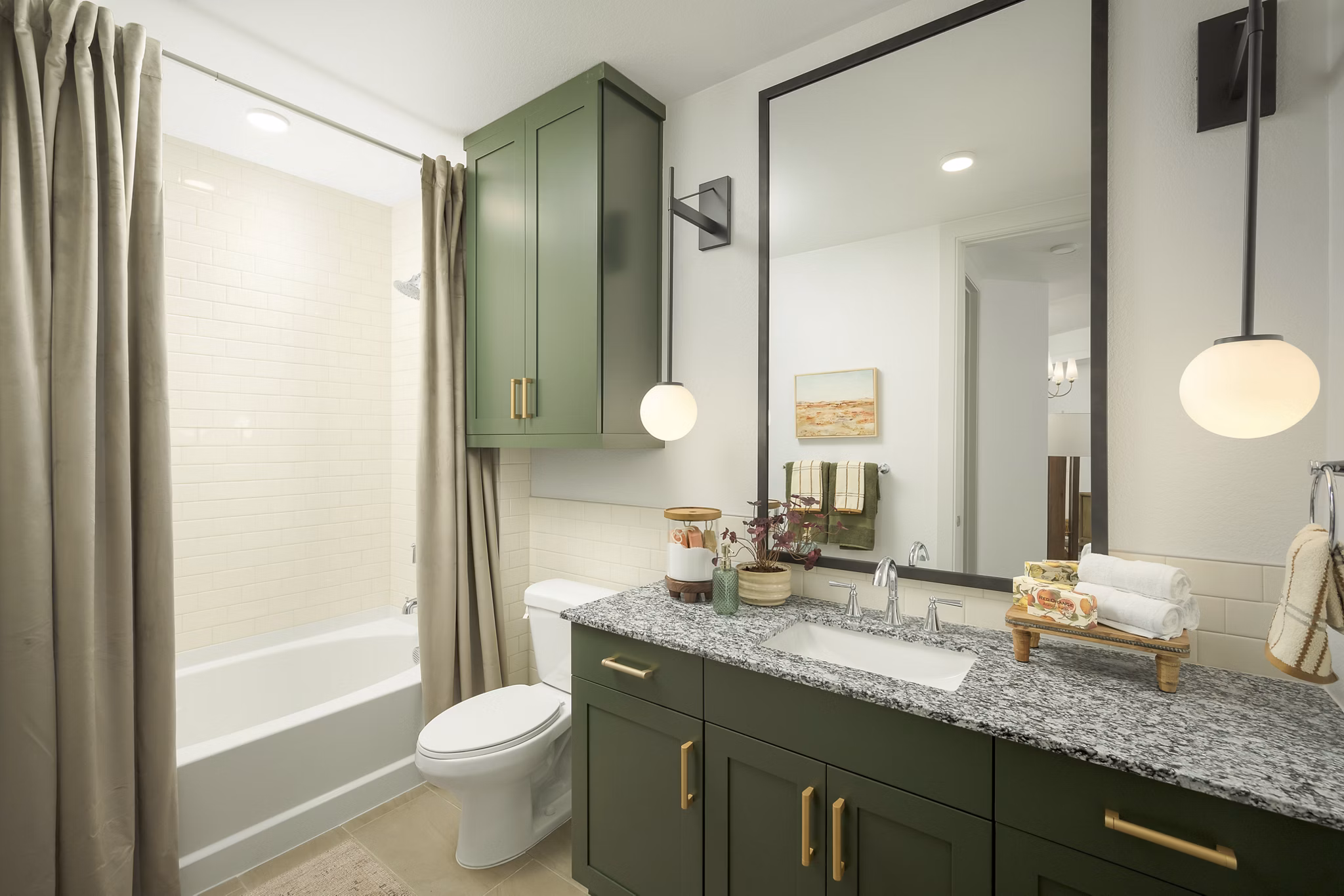 Modern bathroom with designer fixtures at The Alyssa Apartments
