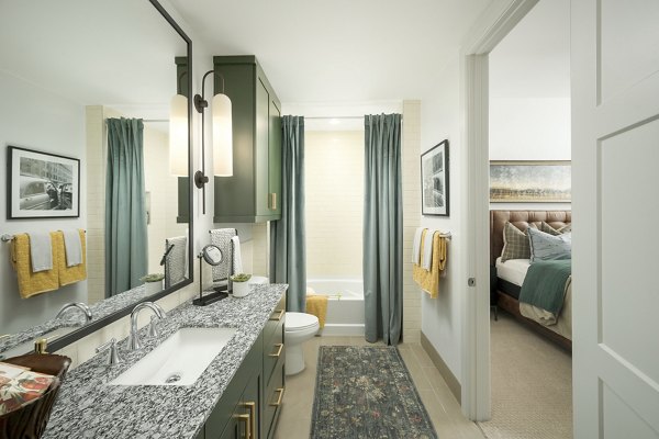 Bathroom featuring modern fixtures and sleek design at The Alyssa Apartments
