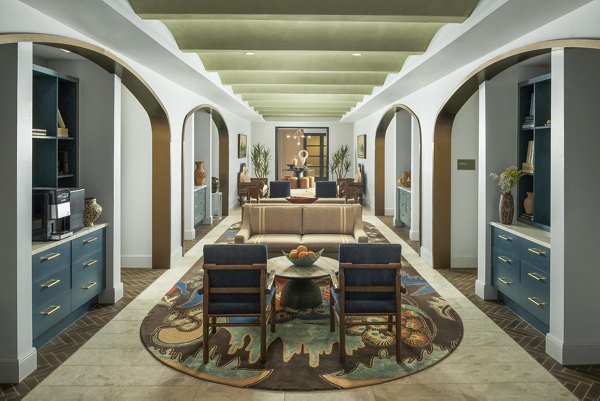 Clubhouse featuring modern decor and cozy seating at The Alyssa Apartments, luxury  community