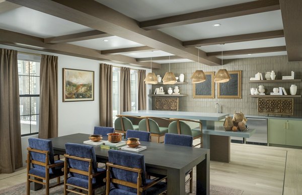 Clubhouse featuring modern design and cozy seating at The Alyssa Apartments