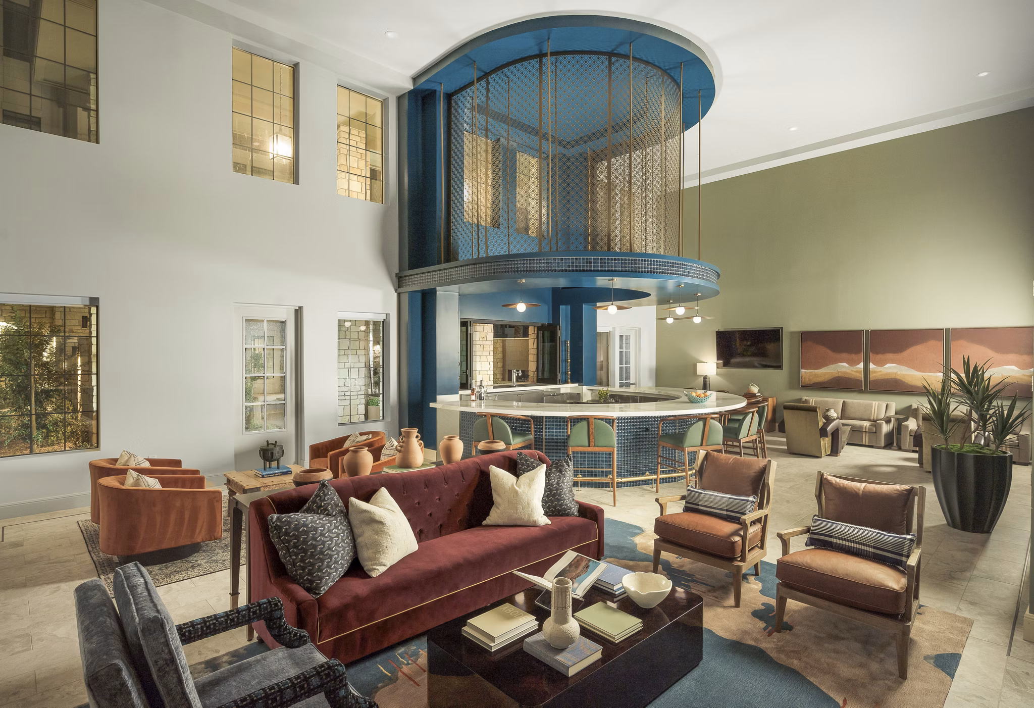Clubhouse at The Alyssa Apartments: Modern communal space featuring stylish seating and large windows
