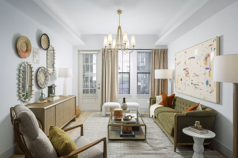 Spacious living room with modern decor at The Alyssa Apartments