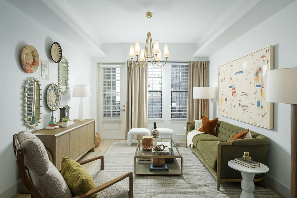 Spacious living room with modern decor at The Alyssa Apartments