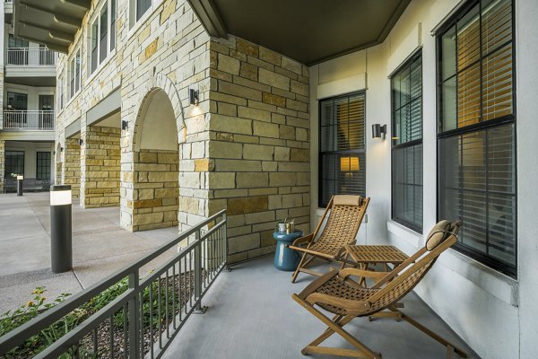 Modern balcony with stylish seating at The Alyssa Apartments