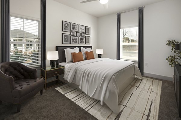 Stylish bedroom with modern decor at Arden Apartments, offering luxury living in a serene setting