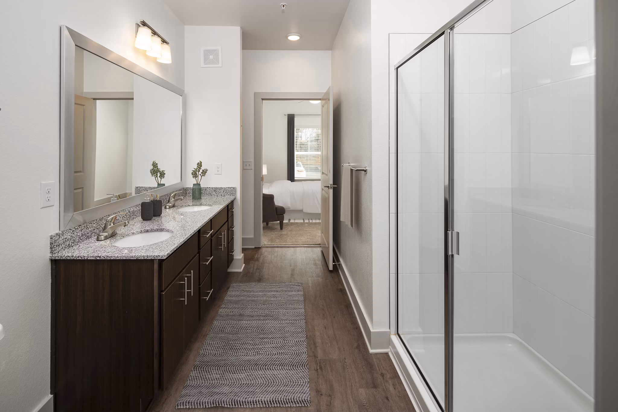 Elegant bathroom featuring modern vanity and sleek fixtures in Arden Apartments
