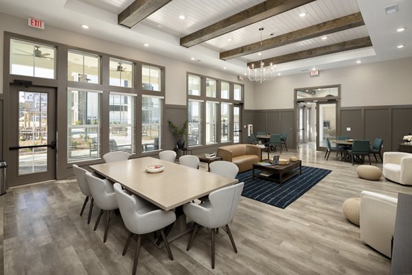 Elegant clubhouse at Arden Apartments with modern seating areas and stylish decor, perfect for social gatherings and events