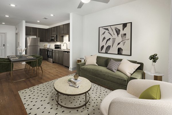 Spacious living room with modern decor and natural light in Arden Apartments