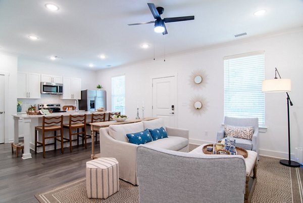 Spacious living room with modern decor in Summerwell Parkway Village Apartments