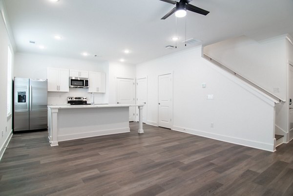 Elegant living room with modern decor at Summerwell Parkway Village Apartments