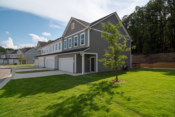 Recreational area with vibrant greenery at Summerwell Parkway Village Apartments