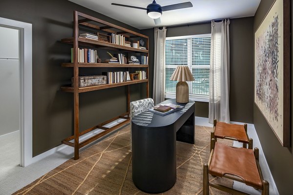 Home office with ergonomic furniture at Milo Apartments, a luxury Greystar community