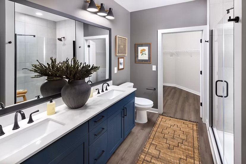 Modern bathroom with sleek fixtures at Milo Apartments, luxury living near amenities and attractions in a prime location