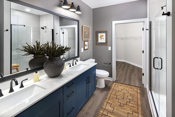 Modern bathroom with sleek fixtures at Milo Apartments, luxury living near amenities and attractions in a prime location