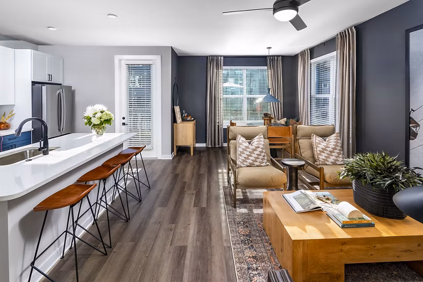 Spacious living room featuring modern furnishings at Milo Apartments, a luxury Greystar property