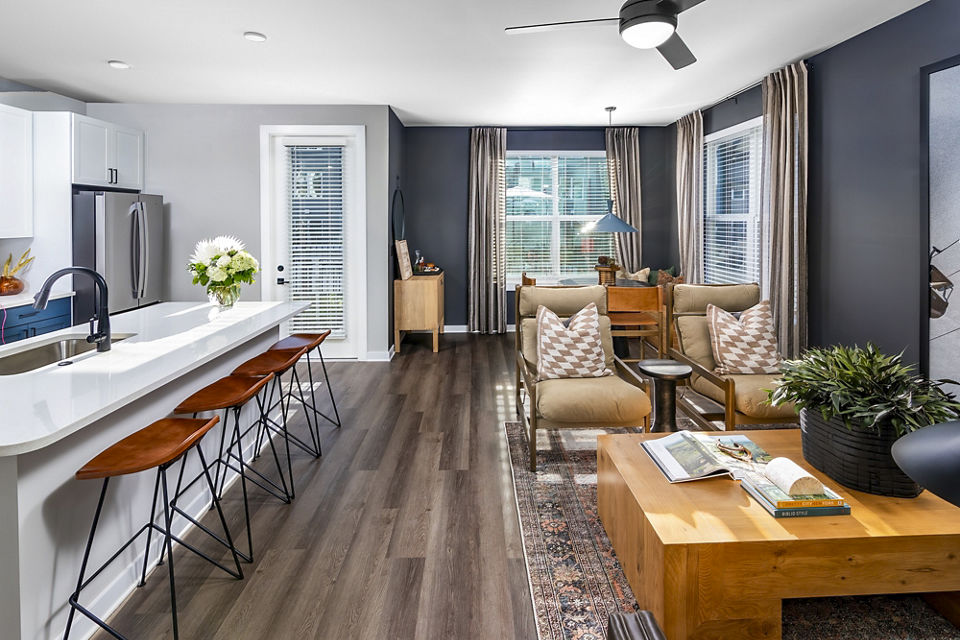 Spacious living room featuring modern furnishings at Milo Apartments, a luxury Greystar property
