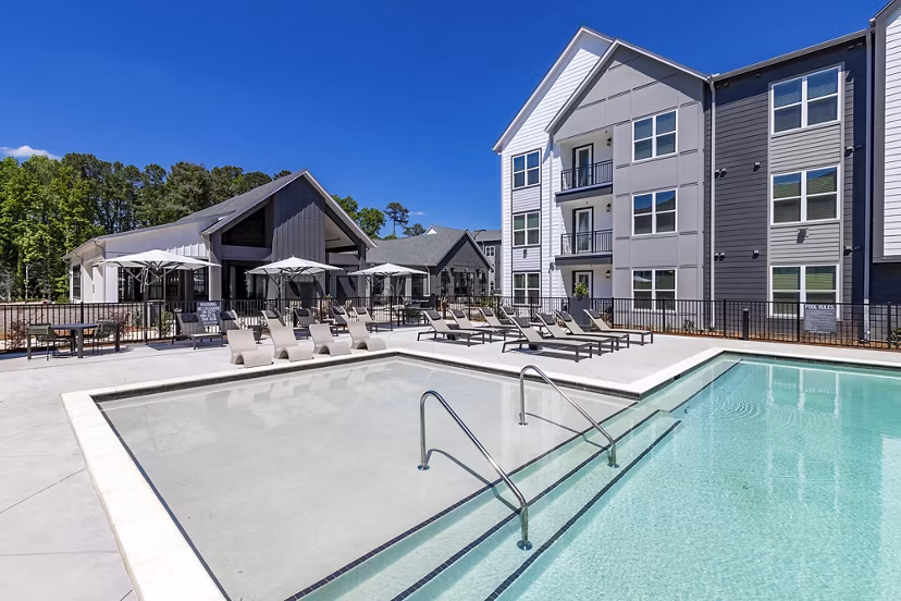 Rooftop pool with panoramic city views at Milo Apartments