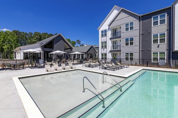 Rooftop pool with panoramic city views at Milo Apartments