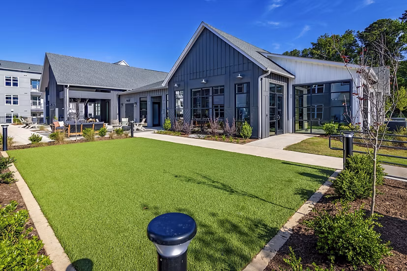 Milo Apartments: Off-leash dog park with agility equipment