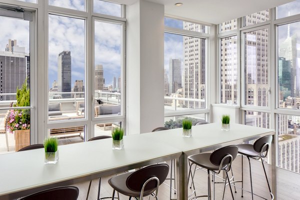 Luxurious clubhouse with modern interiors at The Dylan Apartments, offering residents a premium leisure space to relax and socialize