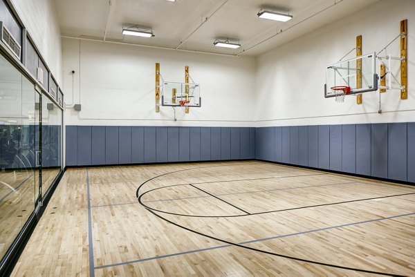 Basketball and tennis court at The Dylan Apartments offering recreational facilities for an active lifestyle