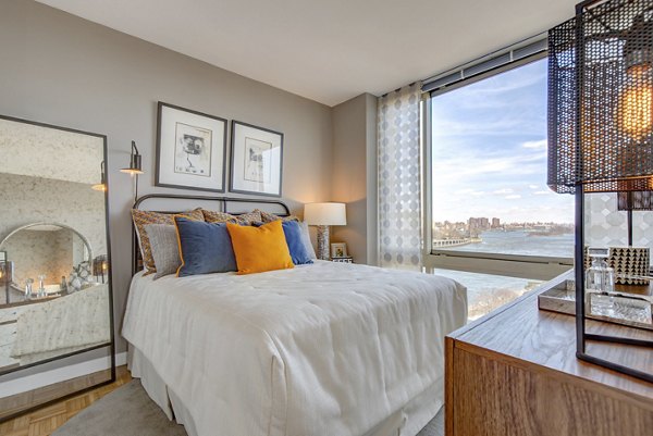 Modern bedroom with stylish decor at The Octagon Apartments, a luxury community in a prime location Perfect for comfortable living
