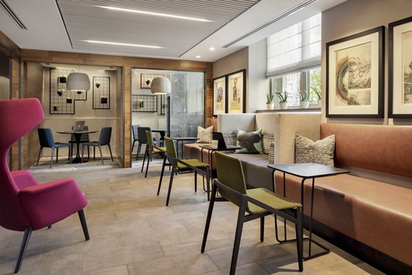 Luxurious clubhouse with stylish design at The Octagon Apartments, perfect for social gatherings and community events
