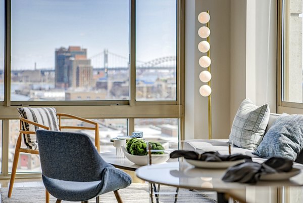 Spacious dining room with modern decor at The Octagon Apartments in NYC, ideal for luxury living