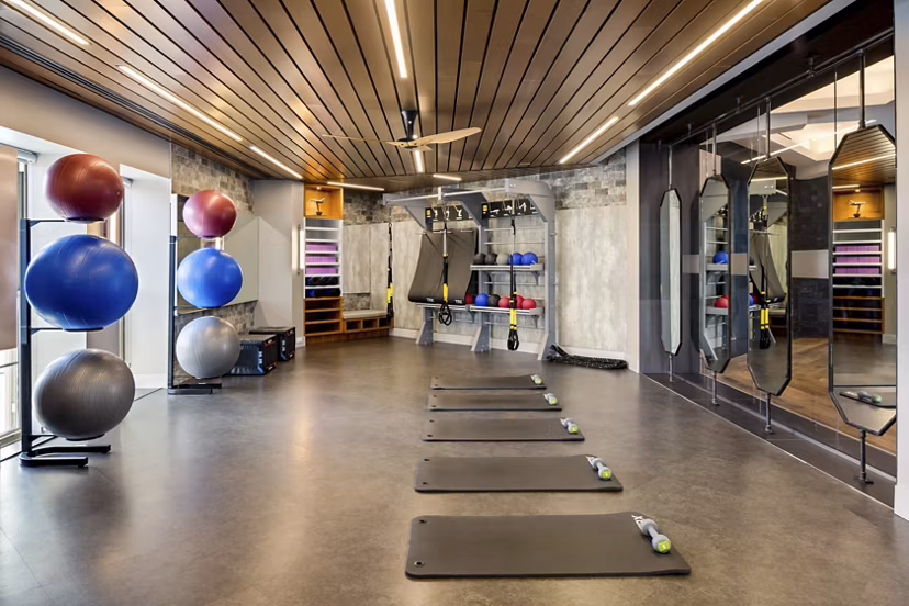 Yoga studio featuring state-of-the-art equipment at The Octagon Apartments