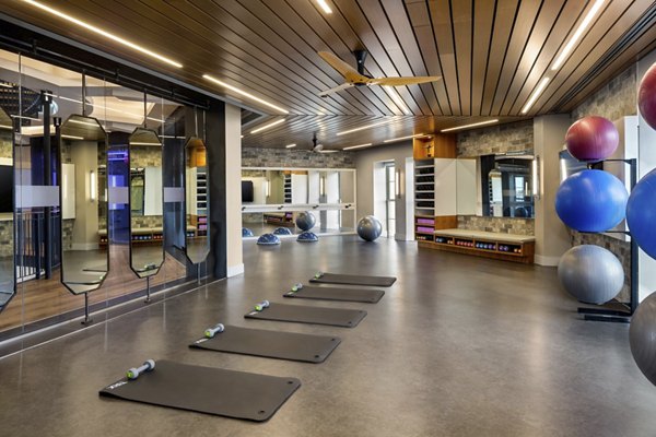 Yoga studio with state-of-the-art equipment at The Octagon Apartments, Greystar luxury living in city center
