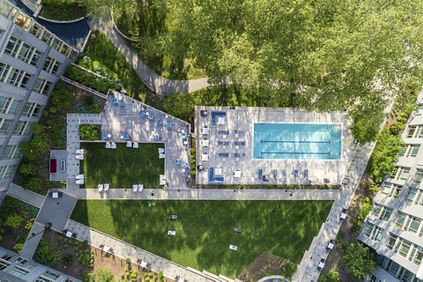 Rooftop pool with city views at The Octagon Apartments