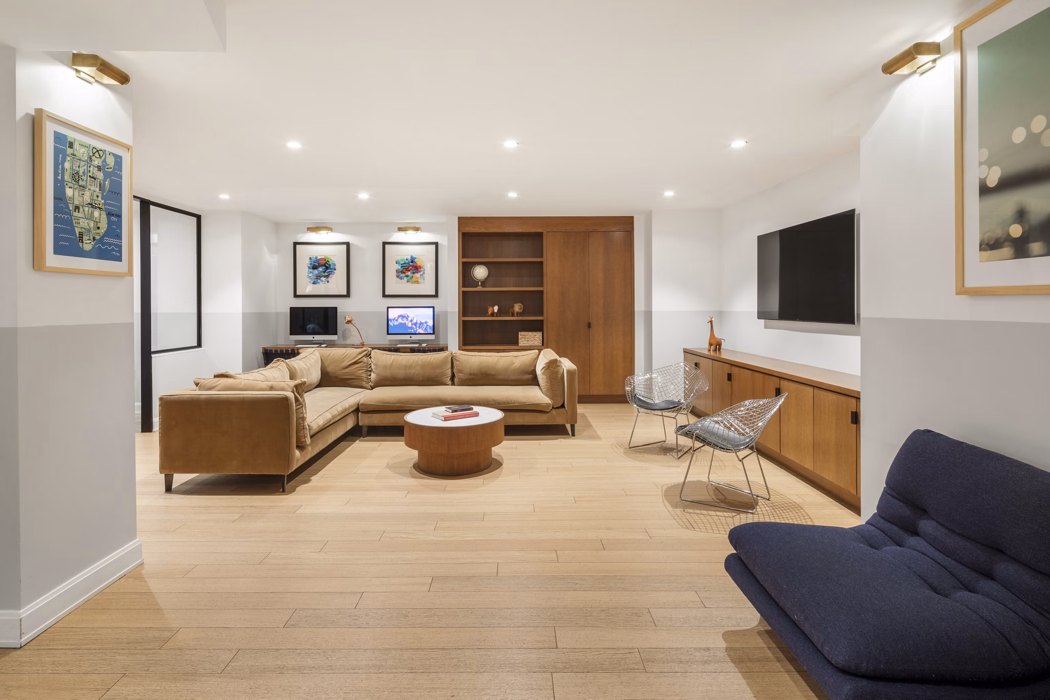 Modern clubhouse featuring spacious seating and a billiards table at Oriana Apartments, luxury living by Greystar in an upscale setting