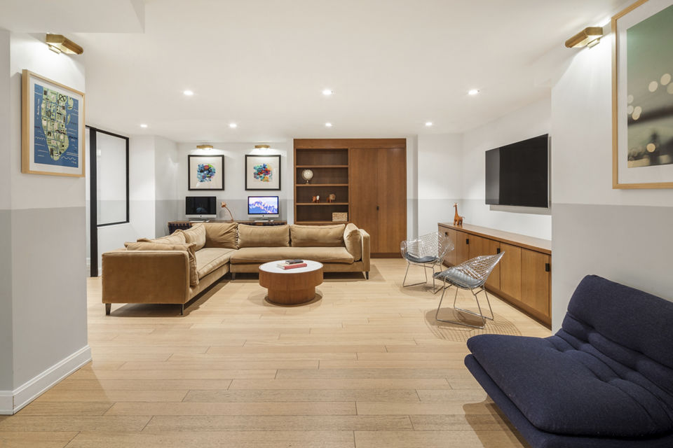 Modern clubhouse featuring spacious seating and a billiards table at Oriana Apartments, luxury living by Greystar in an upscale setting