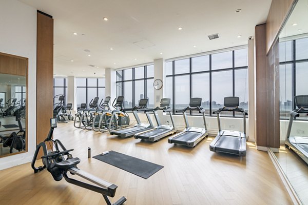 Modern fitness center with state-of-the-art equipment at Oriana Apartments