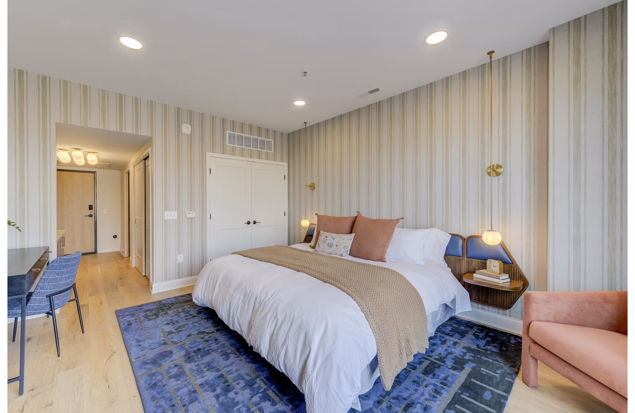 Cozy bedroom with contemporary design at The James Apartments