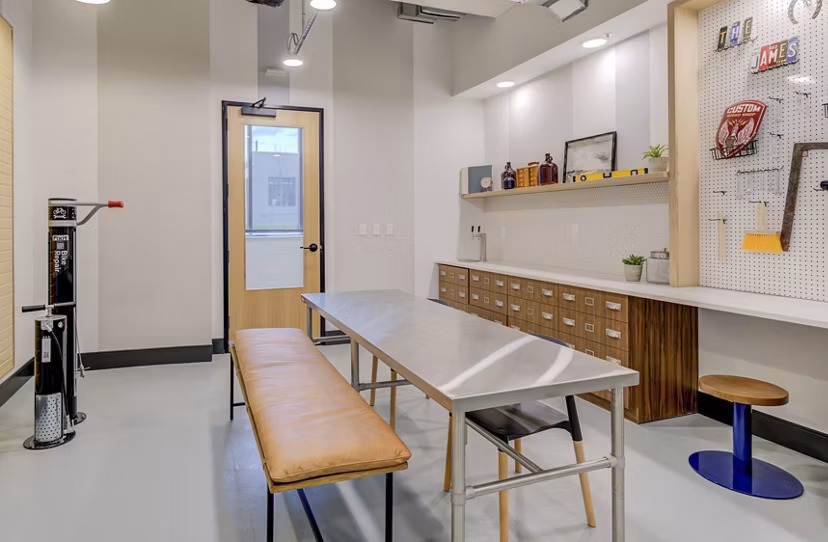 Clubhouse featuring contemporary design and comfortable seating areas at The James Apartments, ideal for social gatherings
