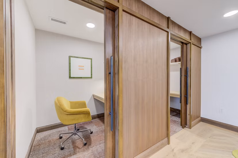 Clubhouse featuring modern interior design at The James Apartments, perfect for leisure and social events