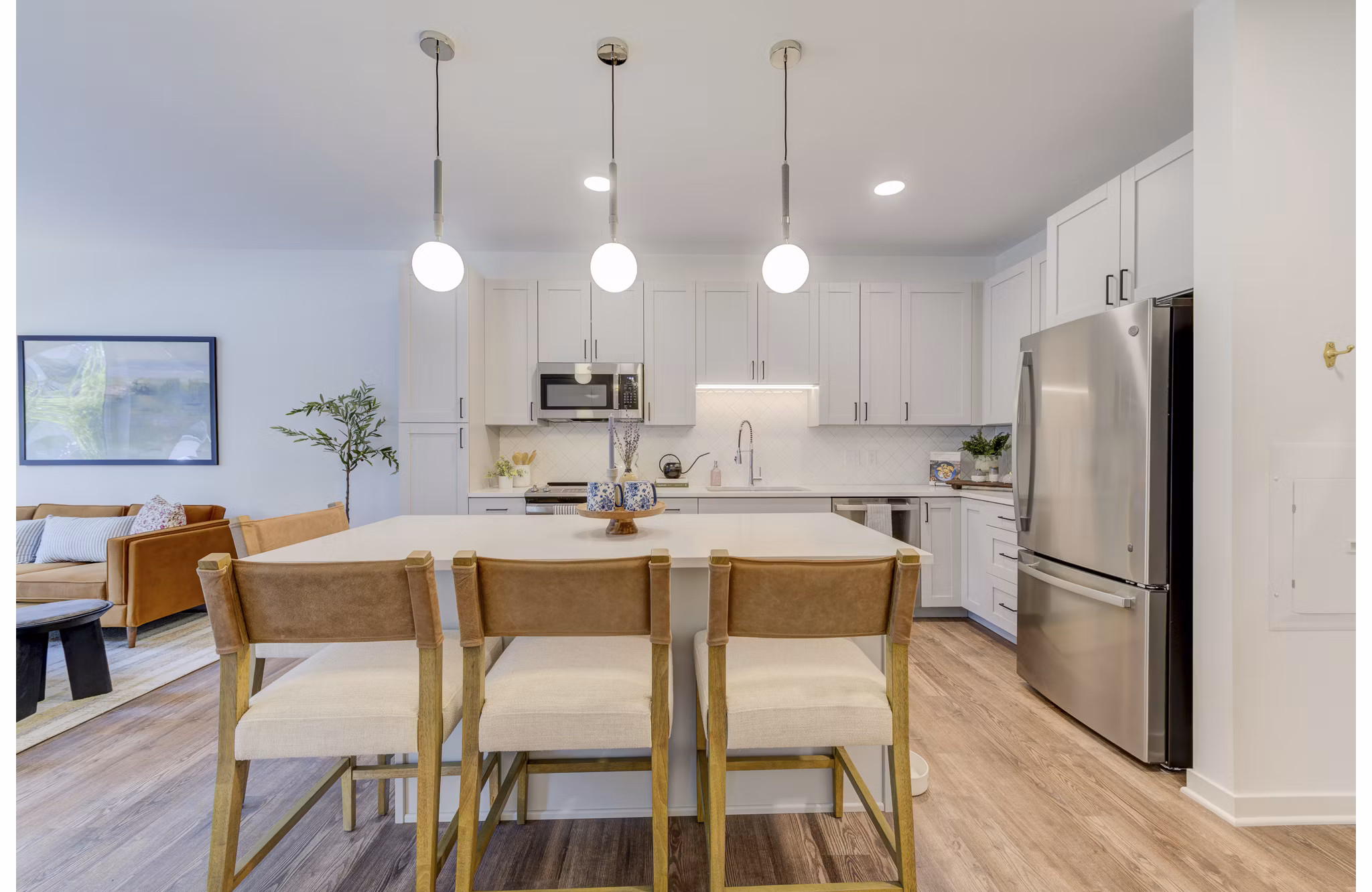 Dining area featuring modern decor and elegant lighting at The James Apartments in luxury living environment