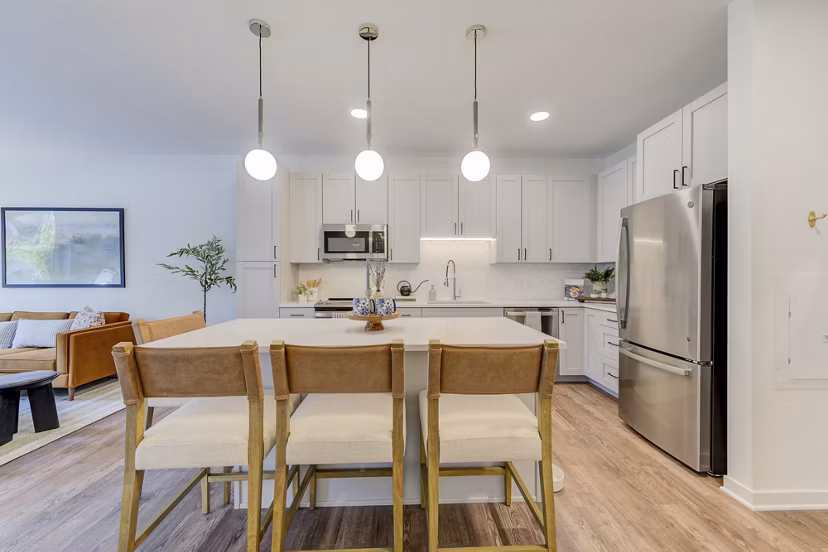 Dining area featuring modern decor and elegant lighting at The James Apartments in luxury living environment