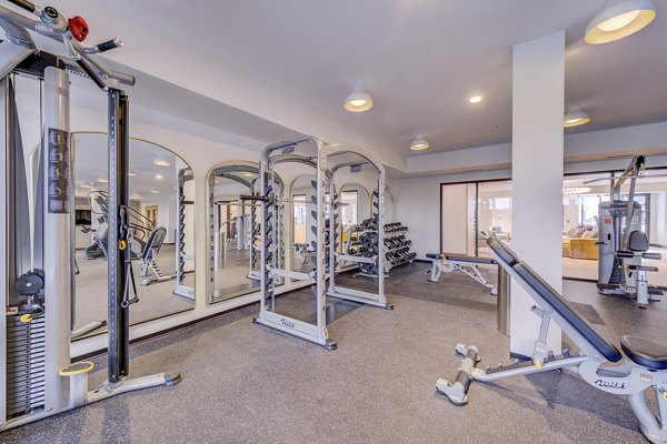 Fitness center featuring state-of-the-art equipment at The James Apartments