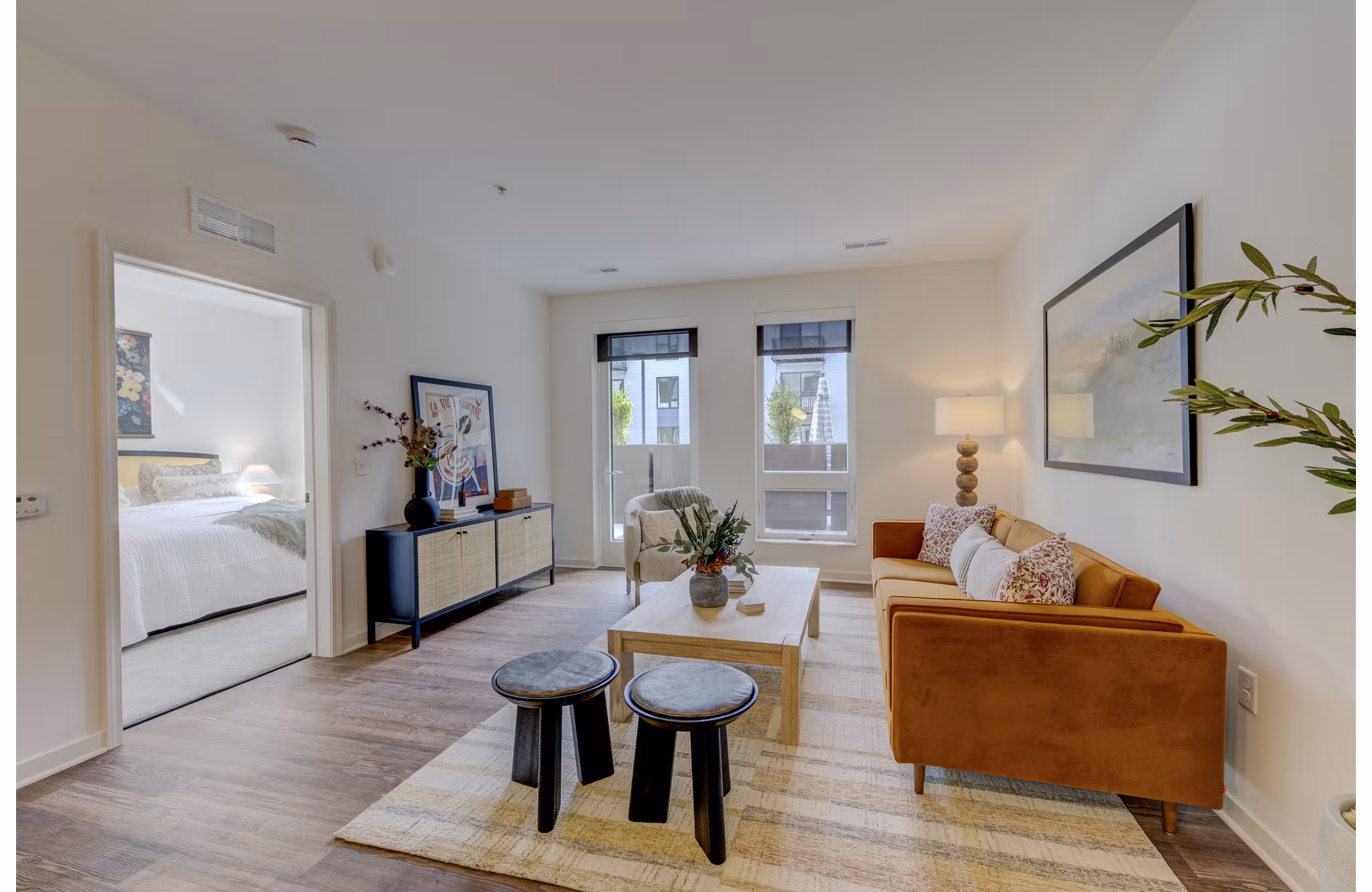 Modern living room with stylish furnishings at The James Apartments
